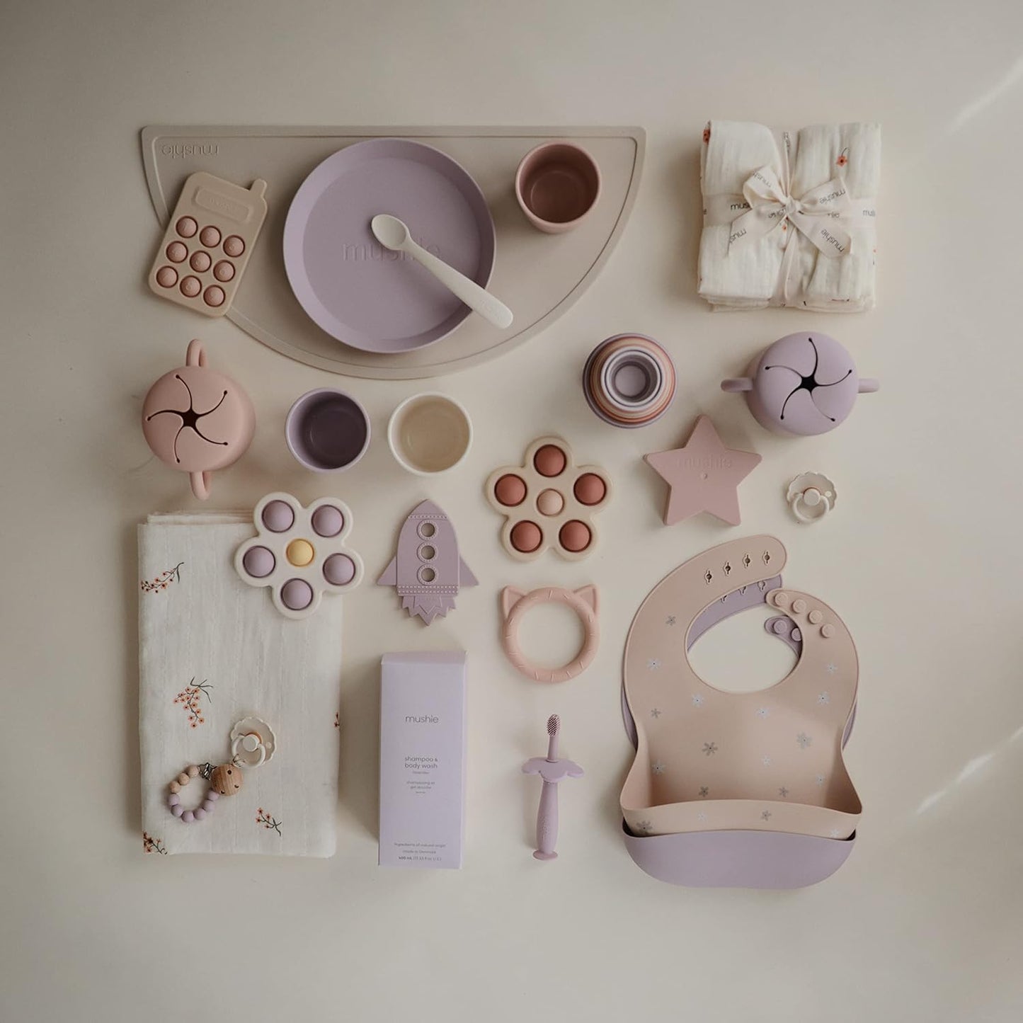 mushie Silicone Baby Bib | Adjustable Fit Waterproof Bibs (Daisy)